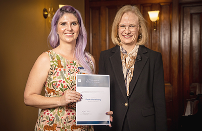 Dr. Jeanette Young presents Katie Havelberg with her QUT Pathways to Politics Certificate.